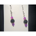 Faceted black with clear hot purple glass short...