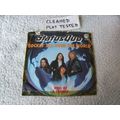 status quo - rockin all over the world - 7" vin...
