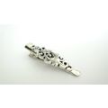 Small silver metal filigree alligator hair clip...