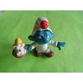 Smurf with a candle