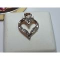 Estate .10ctw Natural Rd Diamond Open Heart 10K...