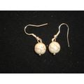 Natural veined round white Howlite swing earrings