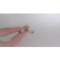 Small gold metal and blue marble hair claw clip