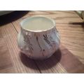Sugar bowl made in England cream color with gol...