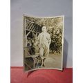 A MAN AND HIS DOG ON A GARDEN SEAT, 1930s? phot...