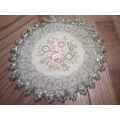 Doily embroidered round shape