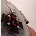 Metal Gothic cross with fire opals 30-inch chai...