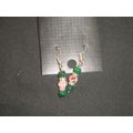 Colourful dark green glass over blended pink be...