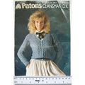 1983 Patons 7145 v neck cardigan in lace patter...