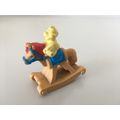 CHICK ON ROCKING HORSE FIGURINE