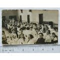 Vintage photo - lots of people seated at a rece...