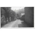 Unknown Location - Two Young Girls Walking Down...
