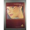 1983 International Gold Corp Ad - The Enlightened Ear