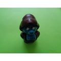 Smurf dressed up as a praying monk