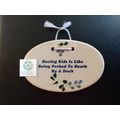 MOUNTAINE MEADOWS SMALL OVAL PLAQUE HAVING KIDS...