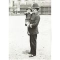 C-36731X: Policeman with a lost child, c.1905.