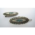 Small oval turquoise blue and silver metal hair...