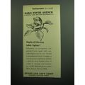 1957 Saks Fifth Avenue Apple-of-the-eye Table Lighter Advertisement