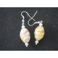 Beautiful hand blown white red yellow glass ova...