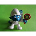 Baby smurf sitting up with rattle and label 2004