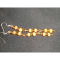 Handmade 80mm 3 section orange glass & wood ear...