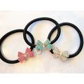 Small bow shaped hair tie pony tail holder with...