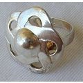 Shiny silver flower ring