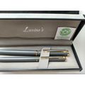 LAVINO'S GRAY AND GOLD PEN AND PENCIL SET IN GR...