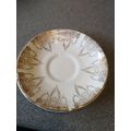 White Saucer With Gold Design