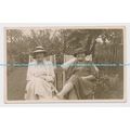 C014634 Two Woman Sitting on the Chair in Garden