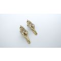Two small gold metal filigree and clear crystal...