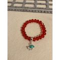 Red glass rondelle elastic bracelet with silver...