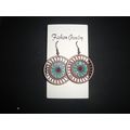 Large round bronze look turquoise colour earrings