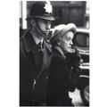 London Policeman Arresting Smoking Transvestite...