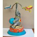 TIN CIRCUS ELEPHANT CARRY PLANE