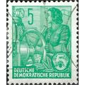 GERMAN DEM REP, 5 year plan, Woman at wheel (ha...