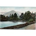 PRINTED POSTCARD OF GRASSMERE AND HELM CRAG CUM...