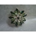 Brooch green cz regal looking vintage