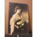 A PRETTY YOUNG GIRL WITH ROSES . unused antique...