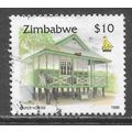 ZIMBABWE 1995 CULTURE $10 PAPER HOUSE USED.