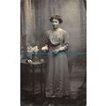 R055898 Old Postcard. Woman with Rose