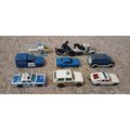 nine police toy vehicles / cars motorbike and h...