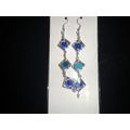 Unique part treated dark & light blue crystal g...