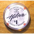 (1) $1. HILTON CASINO CHIP - 1996 - ATLANTIC CI...