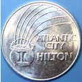Hilton. $1 Casino Token. Atlantic City, NJ. F12.