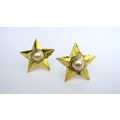 Small distressed vintage look gold star hair cl...