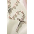 Pink Rosary with two prayer cards and a velvet ...