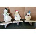 Set of 3 Snowmen Stocking Hangers for Christmas...