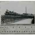 Photo of a steam train and carriages