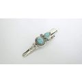 Turquoise blue stone and silver metal alligator...